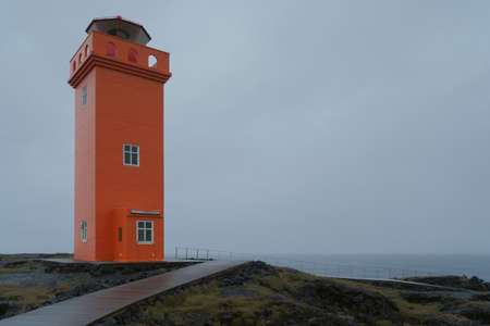 Svortuloft red lighthouse on the cliff near the ocean in Western Iceland. Snaefellsnes (SnÃ¦fellsnes) peninsulaの写真素材