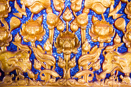 lotus carved gold paint on templeのeditorial素材