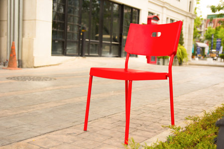 Red chair in the park thailandの写真素材