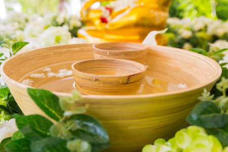 Sprinkle water onto a Buddha imageの写真素材