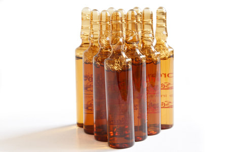 Macro photo of medicine vials isolated on whiteのeditorial素材