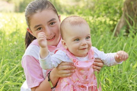 help to walking a baby girlの写真素材