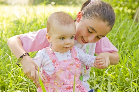 help to walking a baby girlの写真素材