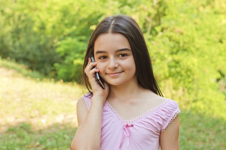 teenage girl talking on cell phoneの写真素材