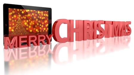Tablet PC with Christmas tree and MERRY CHRISTMASの写真素材
