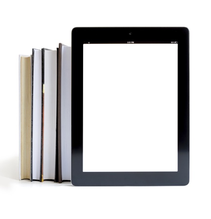 Books and tablet computer isolated on white, digital library conceptの写真素材
