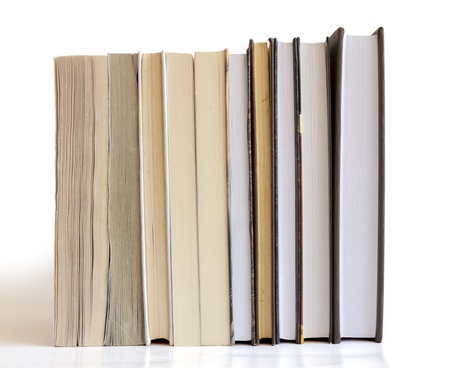 Books in a row isolated on white backgroundの写真素材