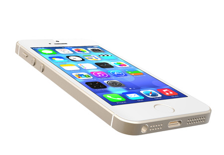 Gold iPhone 5s showing the home screen with iOS7. Some of the new features of the iPhone 5s include fingerprint recognition built into the home button, a new camera, and a 64-bit processor. Apple released the iPhone 5s on September 20, 2013.のeditorial素材