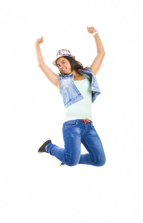 Beautiful teen girl jumping.の写真素材