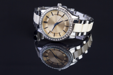 luxury woman watch on black backgroundの写真素材