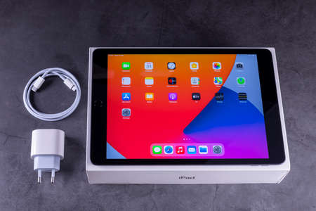 Galati, Romania, March 31, 2021: - Apple release new iPad 8th generation with the powerful A12Â BionicÂ chip, support for AppleÂ Pencil and the SmartÂ Keyboard. iPad 8th generation on desk.のeditorial素材