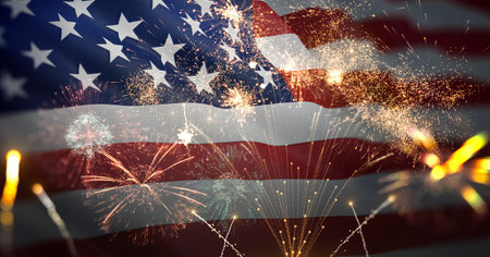 American flag waving with fireworks celebrating 4th of July. Independence, Memorial, Celebration, Fireworks concept.の写真素材
