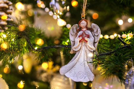 Beautiful Christmas composition with Christmas conifer cones, Christmas tree, holiday decoration, angel. Top view, copy space.の写真素材