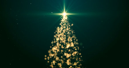 Christmas tree with lights particles and stars on green. Holiday concept and backgroundの写真素材
