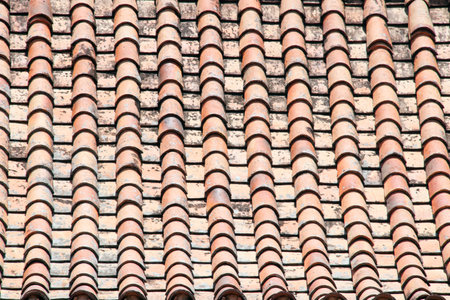 Ancient style of orange brick roof, Thailand.