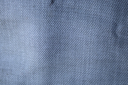 Lighy gray textile background, gray fabric cloth and wavy background.