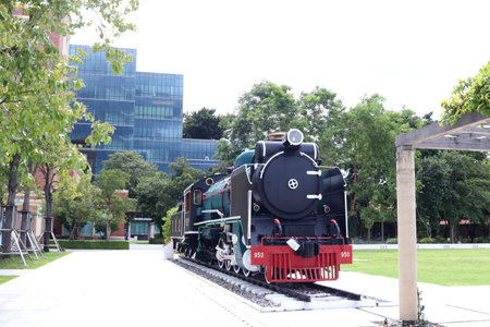 Old head of steam locomotive renovate and present on railroad in public park, Thailand.の写真素材