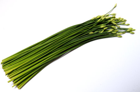 Pile of chinese chive or Garlic chive flowers on white background.の写真素材