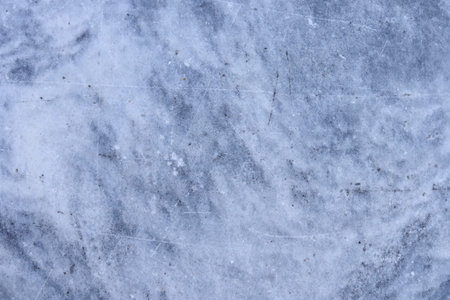 Dark gray and white marble texture background with some scratched on smooth surface.の写真素材