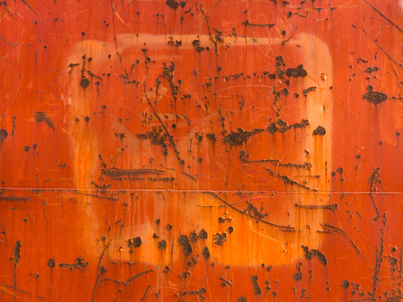 Orange coloured rusty boardの写真素材