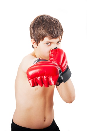 European school-age boy shirtless with boxing glovesの写真素材