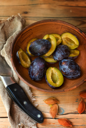 Black sweet plums. Vitamin fruit for breakfast.の写真素材