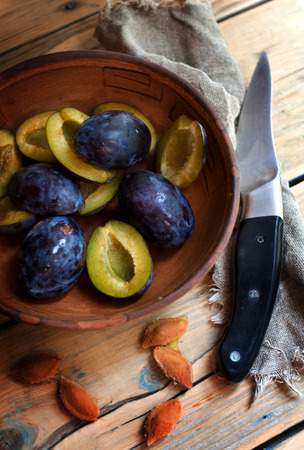 Black sweet plums. Vitamin fruit for breakfast.の写真素材