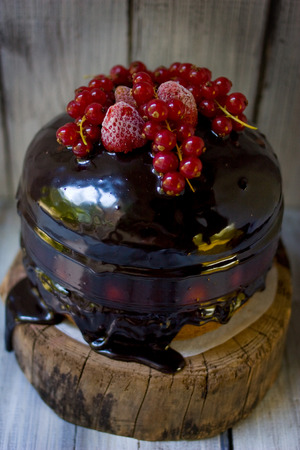 Small sweet chocolate torte with freshness berries.の写真素材