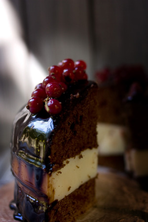 Small sweet chocolate torte with freshness berries.の写真素材