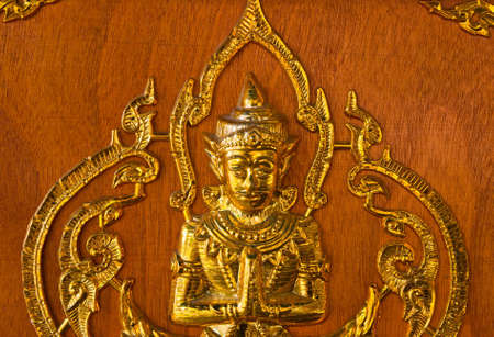 Traditional Thai style Statue on woodのeditorial素材