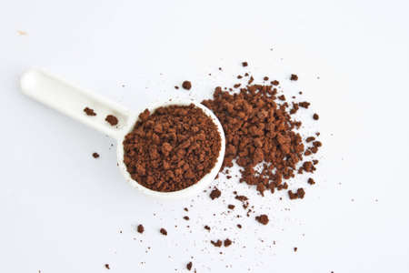 Coffee powder on white の写真素材