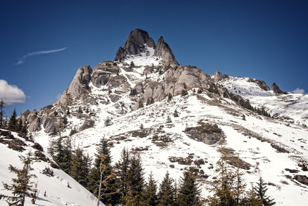 Snowy peaks in the mountainsの写真素材
