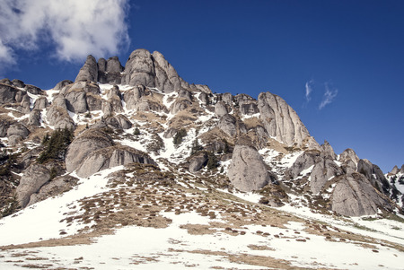 Snowy peaks of a mountainの写真素材
