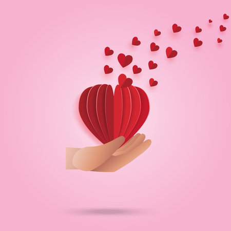 Hand holding red origami heart and flying hearts paper, art style design.Vector illustration.のイラスト素材