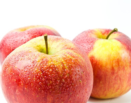  red apples isolated on the white の写真素材