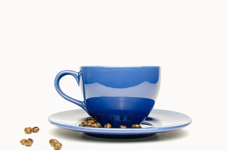  Cup of coffee with coffee beans on white backgroundの写真素材