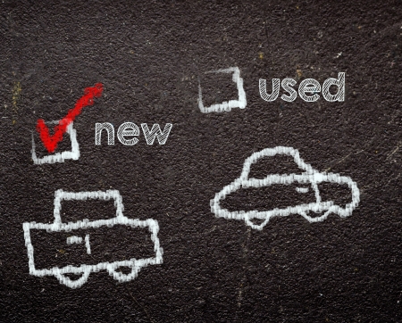 new or used car on blackboardの写真素材