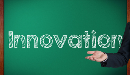 Chalkboard - Innovation presenting on blackboard by handの写真素材