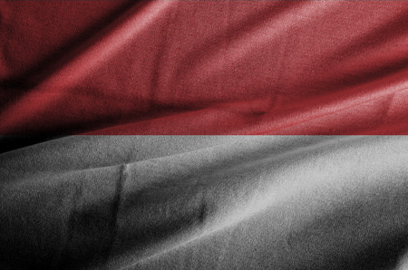 Indonesian flag blowing in the wind.の写真素材
