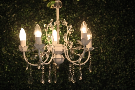 beautiful chandelier light on dark backgroundの写真素材