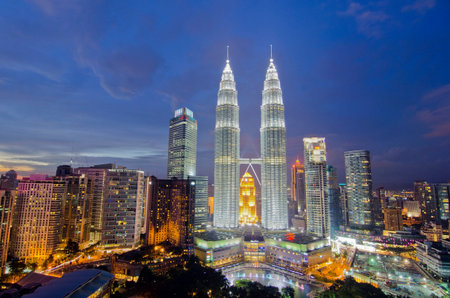 KUALA LUMPUR, MALAYSIA - MAY 19  Petronas Twin Towers at twilight on May 19, 2012 in Kuala Lumpur ...