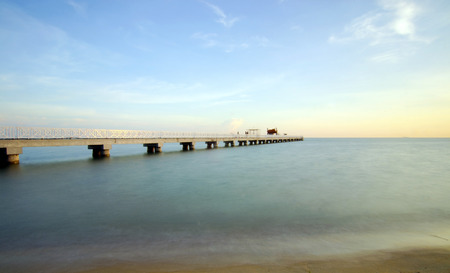 long exposure of a bridge at evening before sunsetの写真素材