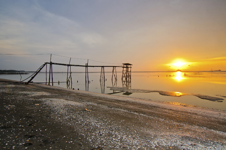 old bridge at jeram beach during sunsetの写真素材