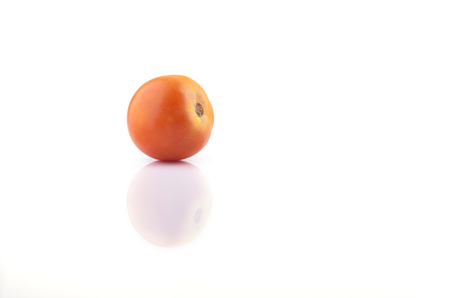 vine tomatoes on white backgroundの写真素材