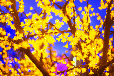 Blur image of modern light at the theme park with bokeh effect. Noise visible due to high isoの写真素材
