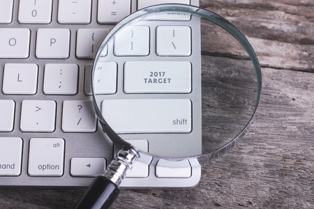 Business concept: 2017 TARGET on computer keyboard ans stethoscope on wooden background with copyspace area.の写真素材