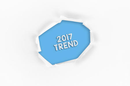 Torn paper with a 2017 TREND word on red backgroundの写真素材
