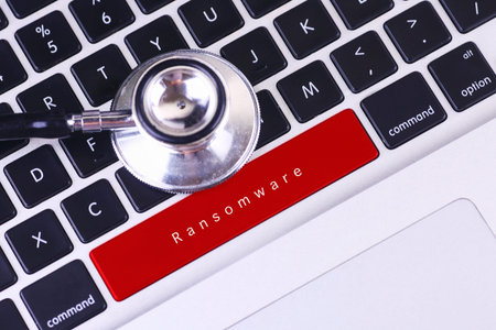 Business concept: Ransomware on computer keyboard background with copyspace area.