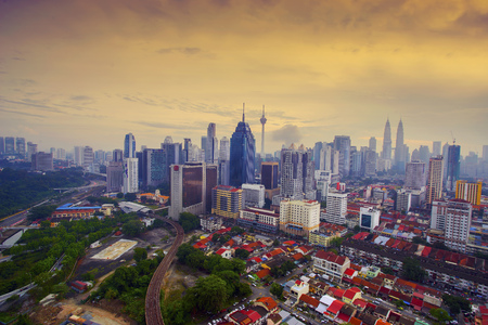 Kuala Lumpur city during dramatic sunsetの写真素材