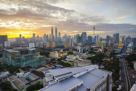 Kuala Lumpur city during dramatic sunsetの写真素材